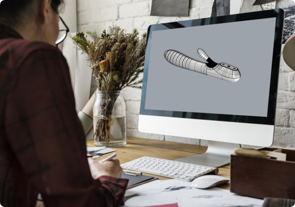designer is building 3d model of vibrator